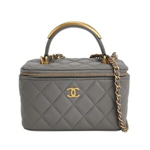 CHANEL Quilted Gray Cosmetic Case with Gold Accents